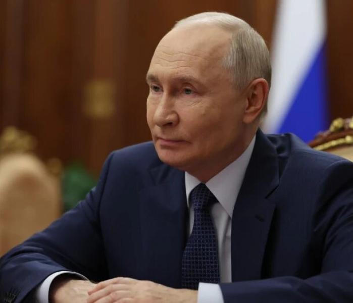 Путин